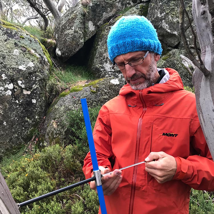 Dr Matthew Brookhouse extracting a sample