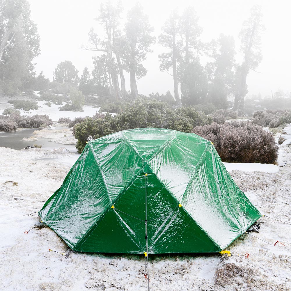 Mont Dragonfly tent covered in iced snow in Tasmania's Central Plateau