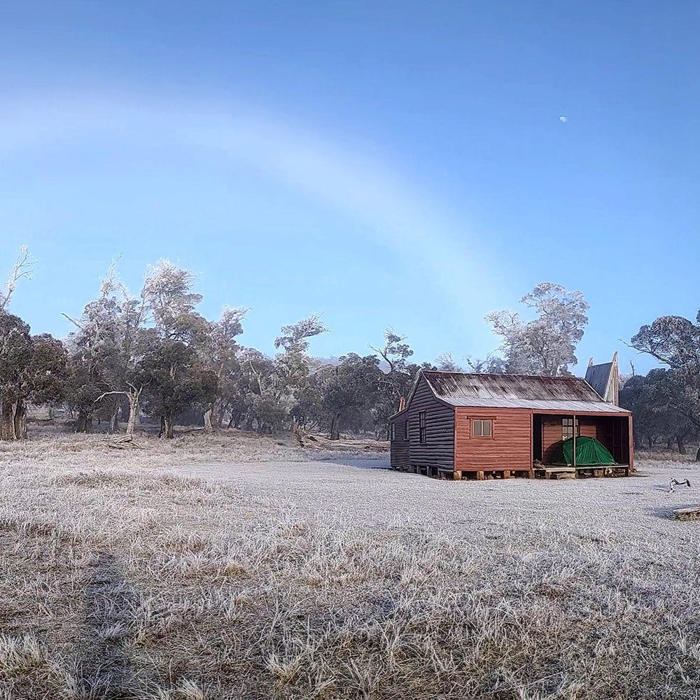 A frost rainbow over Pockets Hut and Mont Dragonfly Tent. By Mont staff member Jaxon Kneipp