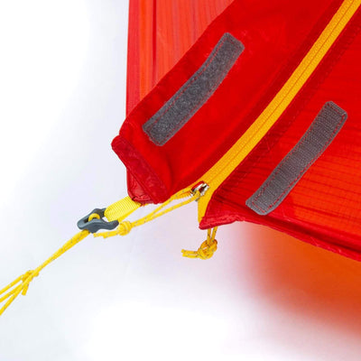 Fly doors with generous over zip flaps with multiple hook-and-loop closures.